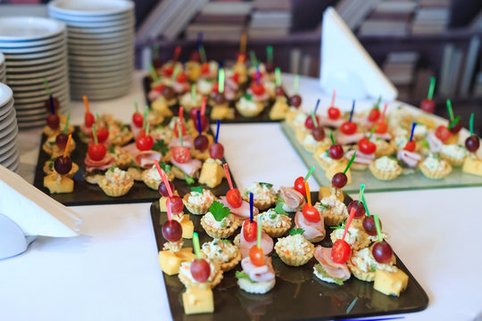 the buffet at the reception. Assortment of canapes.