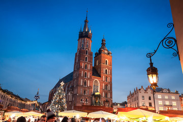 Fototapeta premium Christmas market in Krakow city on evening