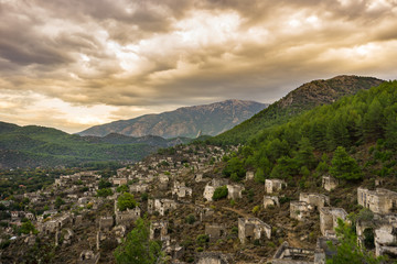 Fototapeta na wymiar Kayakoy houses in historcial Lycian village of Kayakoy, Fethiye, Mugla, Turkey. Ghost Town Kayaköy, anciently known as Lebessos and Lebessus. 3000 Greek life in the 19th century.