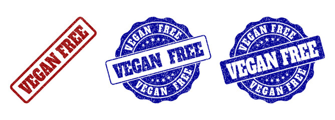 Obraz premium VEGAN FREE grunge stamp seals in red and blue colors. Vector VEGAN FREE watermarks with grunge style. Graphic elements are rounded rectangles, rosettes, circles and text labels.
