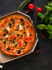 pizza, mushrooms, olives, chicken, tomato sauce, cheese, (pizza ingredients). hot pizza. Top view. copy space