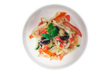 Calamari salad. isolate. decorated with greens. restaurant feed