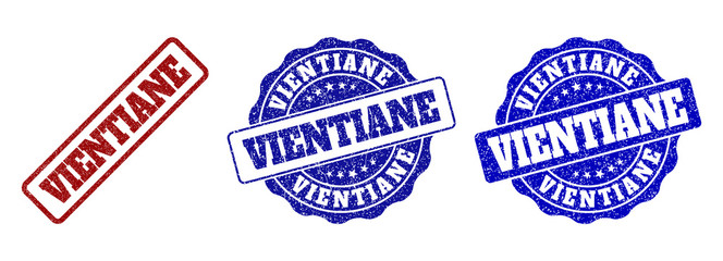 Obraz premium VIENTIANE scratched stamp seals in red and blue colors. Vector VIENTIANE marks with scratced surface. Graphic elements are rounded rectangles, rosettes, circles and text labels.