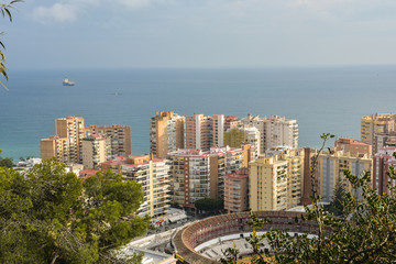 City of Malaga. Sea and bullfighting arena.