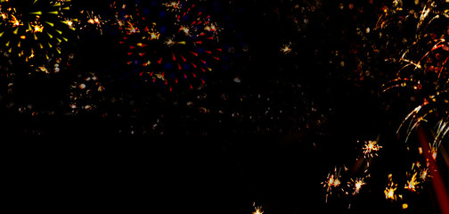 Firework display on a black backround. Free space for text.