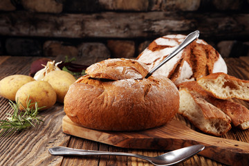 Homemade potato cream soup, served in bread bowl.