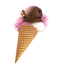 Strawberry, chocolate and Vanilla ice cream scoops on cone isolated on white background