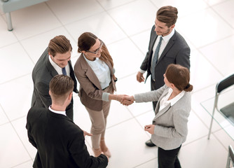 top view.handshake of two business women before the meeting.