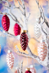 Christmas greeting card. Pine decoration on bokeh background. New Year concept. Copy space.
