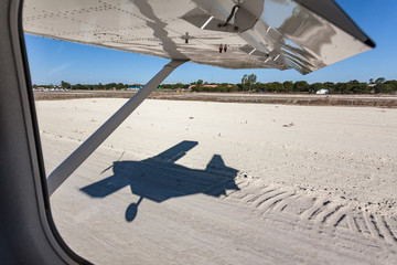 scenic flight above botswana with small bush plane in summer in africa