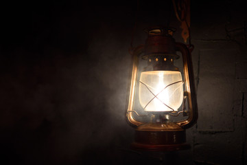 vintage lantern on a dark background © Anton Shulgin