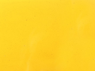 Texture of honey with air bubbles as background