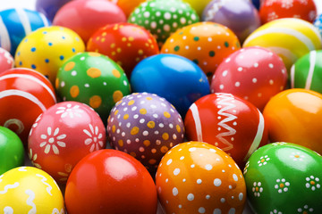 Many decorated Easter eggs as background. Festive tradition