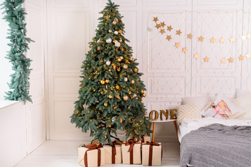 Christmas bedroom interior with large Christmas tree