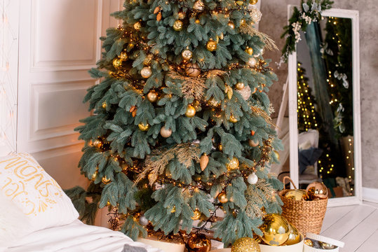 Christmas bedroom interior with large Christmas tree