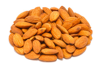 Handful of raw almond seeds (Prunus dulcis) without shell, close up, isolated on white background