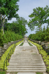 Fototapeta na wymiar Yonkers, New York, USA: The Vista, a staircase leading from the Walled Garden to a view of the Hudson River, at Untermyer Park and Gardens.