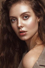 Fototapeta premium Beautiful brunette model : curls, classic makeup and sexy lips. The beauty face.