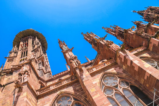 View on the Minster Cathedral in Freiburg im Breisgau, Germany on a sunny day.