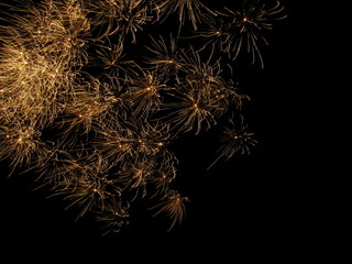 gold sparkly fireworks in corner