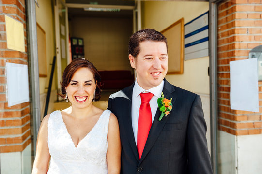 Similing just married couple after the wedding ceremony