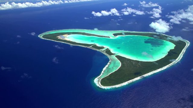 Aerial view of the coral atoll reef Tupai Heart Island South Pacific Ocean 