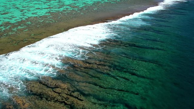 Aerial view of the coconut plantation Tupai Heart Island in the South Pacific 