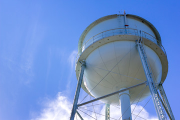 White Water Tower in Blue Sky with Copy Space