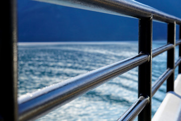 Fototapeta na wymiar ship railing overlooking water