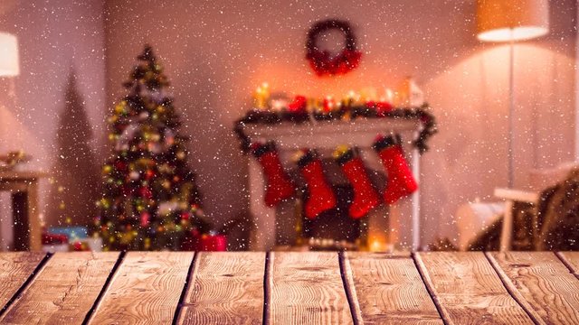 Blurred background of a living room decorated for christmas combined with falling snow