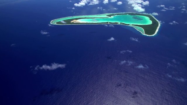 Aerial of Tupai Heart Island coral lagoon atoll French Polynesia South Pacific 