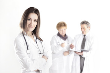 Fototapeta premium confident female doctor therapist on blurred background of colleagues