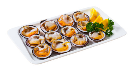 Fototapeta na wymiar Fresh bivalve mussels with lemon