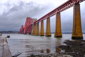 Horizontal View of Forth Bridge from viewed from South Queensferry on stormy day, Queens Ferry,...