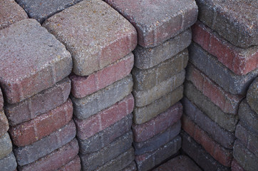 Stacks of muticolored cement pavers
