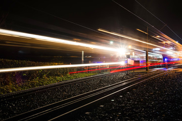 Fototapeta na wymiar rack railway drachenfelsen koenigswinter at night speed lights