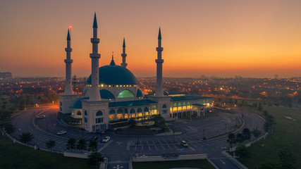 Fototapeta na wymiar Aerial Photo - Sunrise at a Sultan iskandar Mosque.