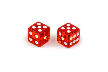 Two red glass dice isolated on white background. Five and five.