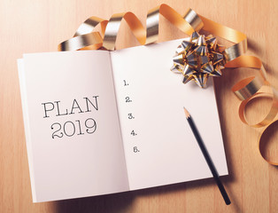 2019 New Year plan with gold decoration.