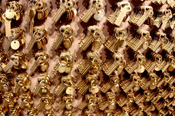 rows of keys on a wall for sale