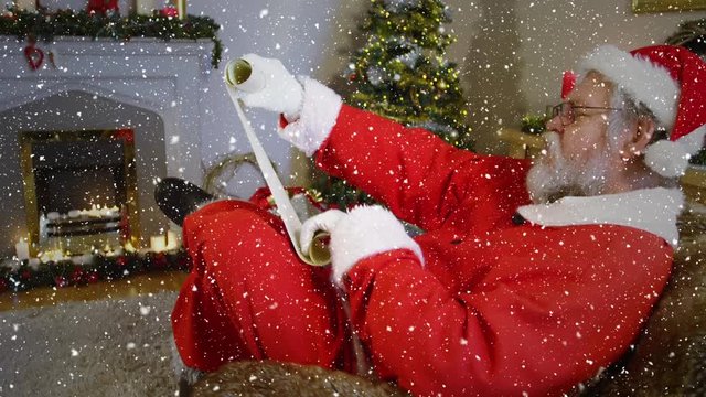 Video composition with falling snow over santa  looking at wish list