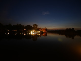 Fototapeta premium Good view and Light show at the bridge on the River Kwai, KANCHANABURI THAILAND.