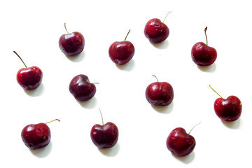 Cherries on white background