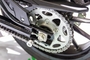 Close up Detail of a motorcycle rear chain part of the motorcycle, concept New innovation.