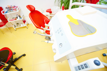 dental instruments on the background of the patient's chair, dental office, dental treatment