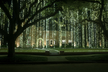 House with a curtain of light garlands. Christmas decor. Winter, Night, Houston, Texas,  United States