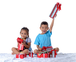 portrait of happy little asian boy and girl with Many gift boxes isolated on white background