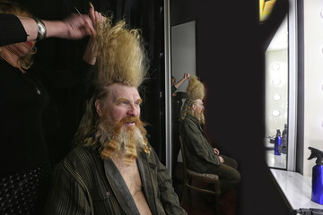 adult man with a beard and a high mohawk