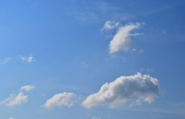 Cumulus cloud on beautiful blue sky , Fluffy clouds formations at tropical zone , Thailand