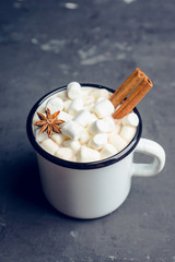 Sweet hot chocolate in mug. Christmas drink with marshmallow. Selective focus. Shallow depth of field. 